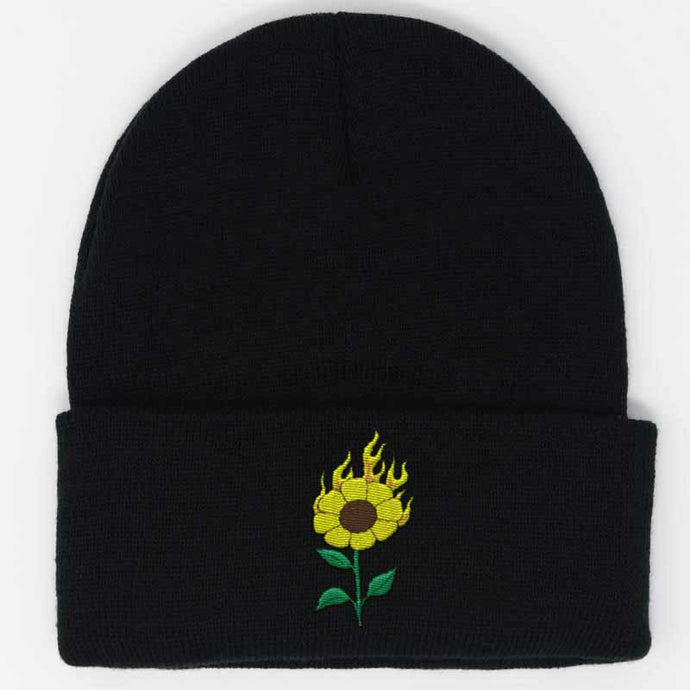 burning sunflower embroidered on a black beanie