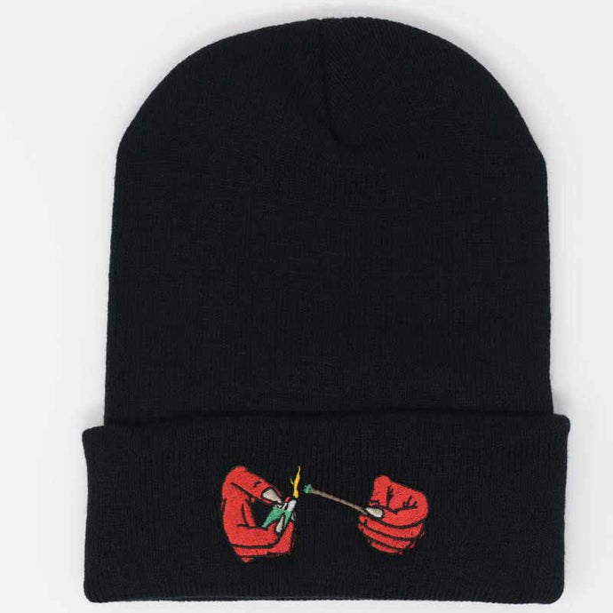 demon hands lighting a blunt embroidered on a black beanie