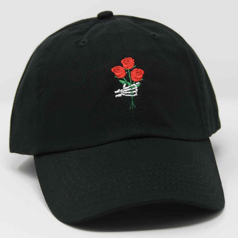 Load image into Gallery viewer, side view of black hat with an embroidered skeleton hands holding red roses
